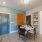 Large well lit dining area with wood floors
