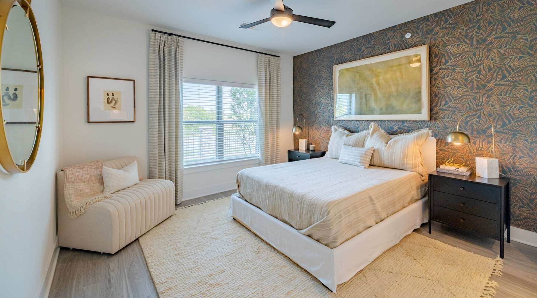 Bedroom Large well lit bedroom with wood floors